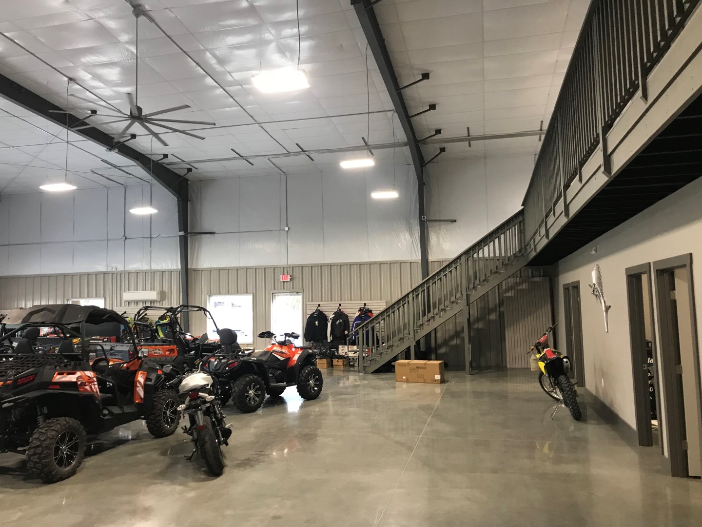 vehicles inside of avalanche motorsports building